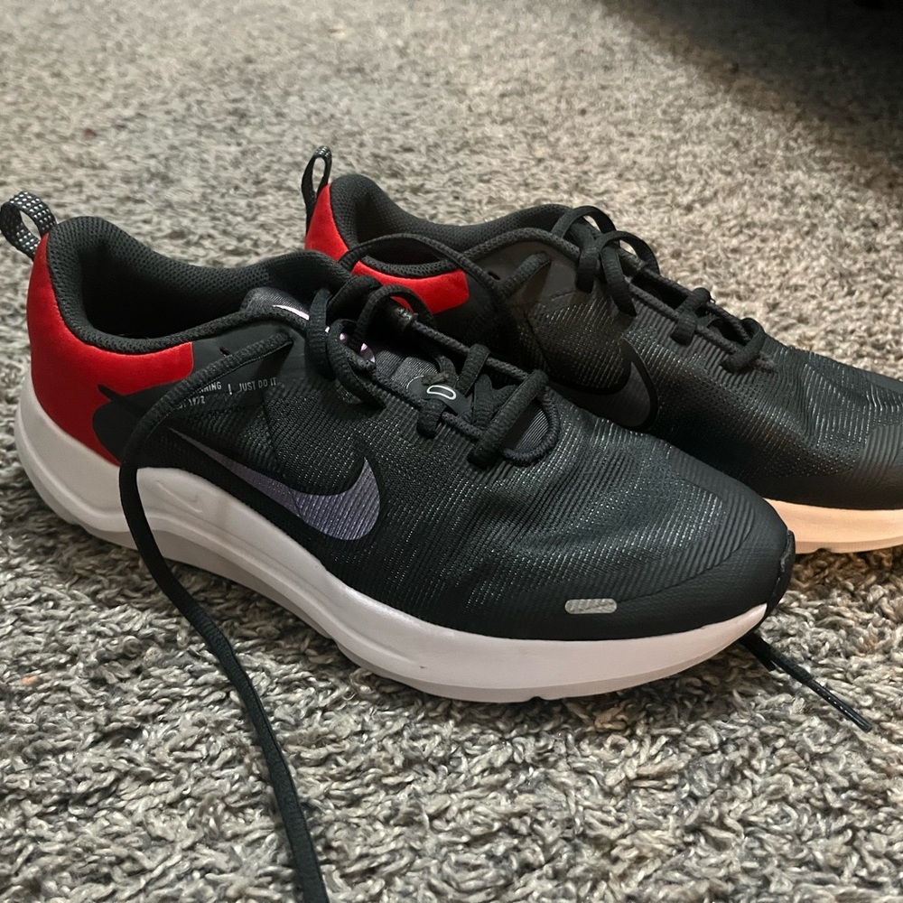 Nike Black and Red Sneakers with Mesh Upper and Gum Outsole